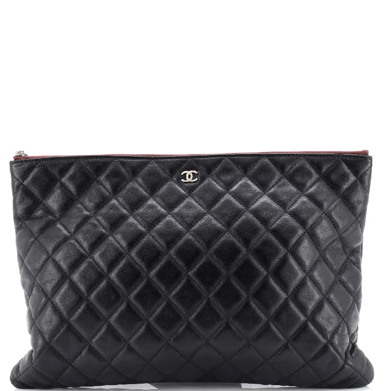 Luxury bags with exotic skinsO Case Clutch Quilted Lambskin Large