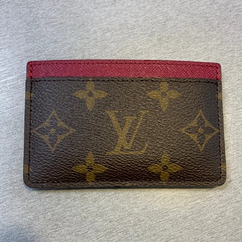 Louis Vuitton bags with a chain - link trim and a leather body for a modern edgeLouis Vuitton Monogram Fuchsia Card Holder