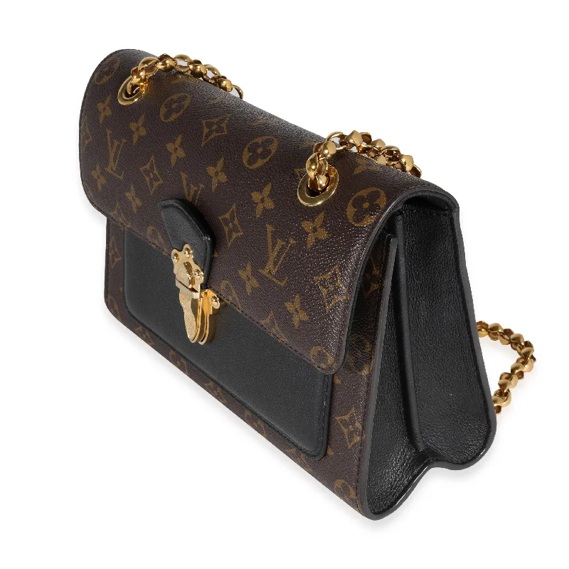 Ladies Louis Vuitton Capucines bags with a detachable shoulder strapLouis Vuitton Monogram Canvas & Black Leather Victoire Bag