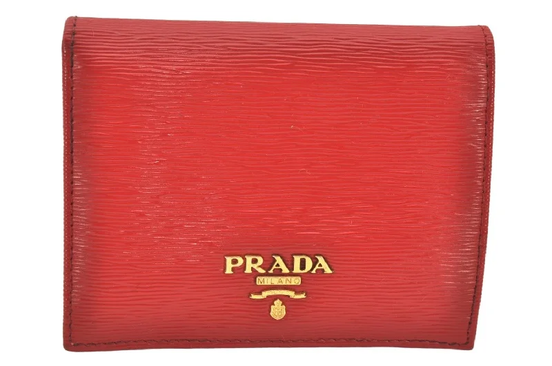 Prada handbags with a perforated leather detail for a unique and breathable designAuthentic PRADA Vintage Leather Bifold Wallet Purse Red 5863K