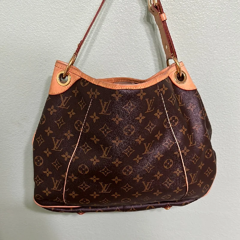 Louis Vuitton crossbody bags with a woven leather strap for textureLouis Vuitton Monogram Galliera PM