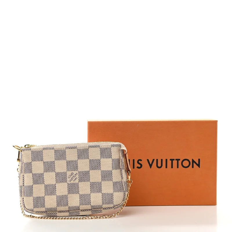 Louis Vuitton Twist bags with a crystal - embellished LV - turnlockLOUIS VUITTON Damier Azur Mini Pochette