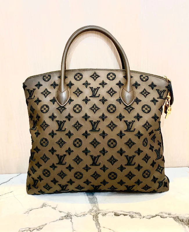 Ladies Louis Vuitton Petite Malle bags with a star - shaped charm for cutenessLOUIS VUITTON LOCKIT BAG - LIMITED EDITION