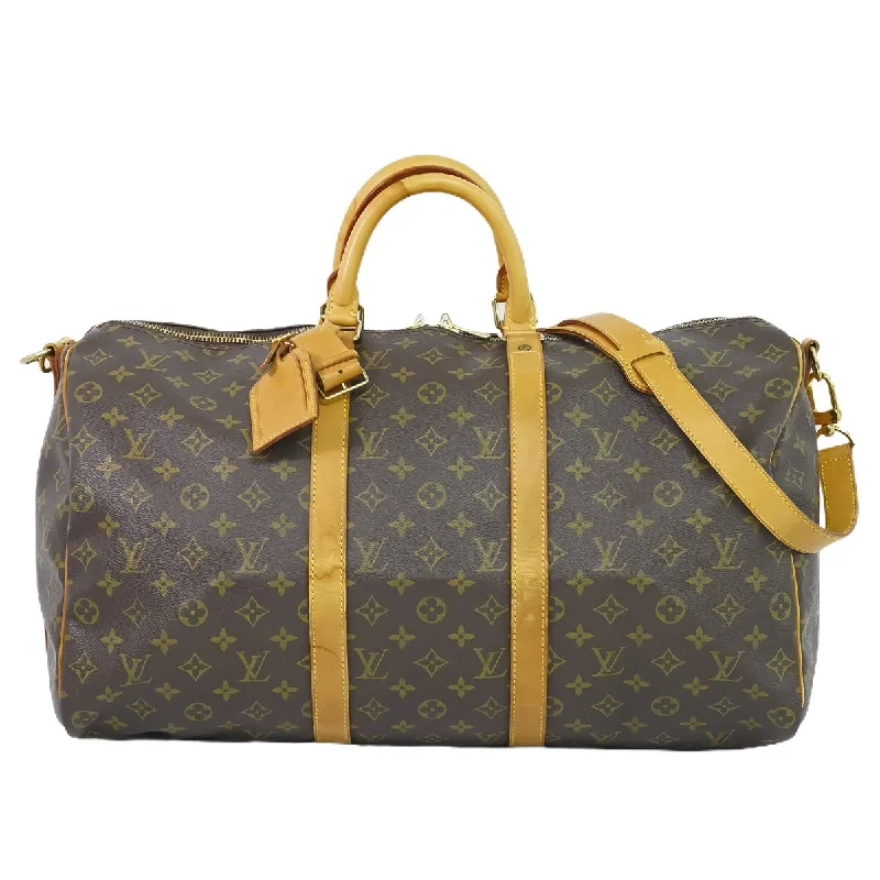 Louis Vuitton bags with a snap - button closure and a decorative charm for styleLouis Vuitton Keepall Bandouliere 50 M41416