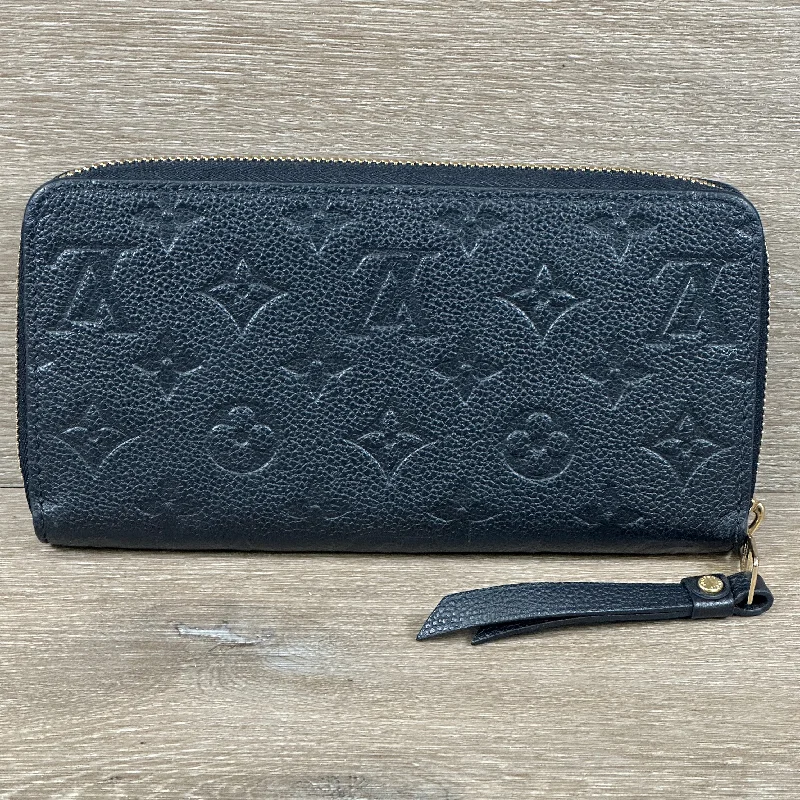 Louis Vuitton bags with a chain - link trim and a leather body for a modern edgeLouis Vuitton Monogram Empriente Zippy Long Wallet - Black