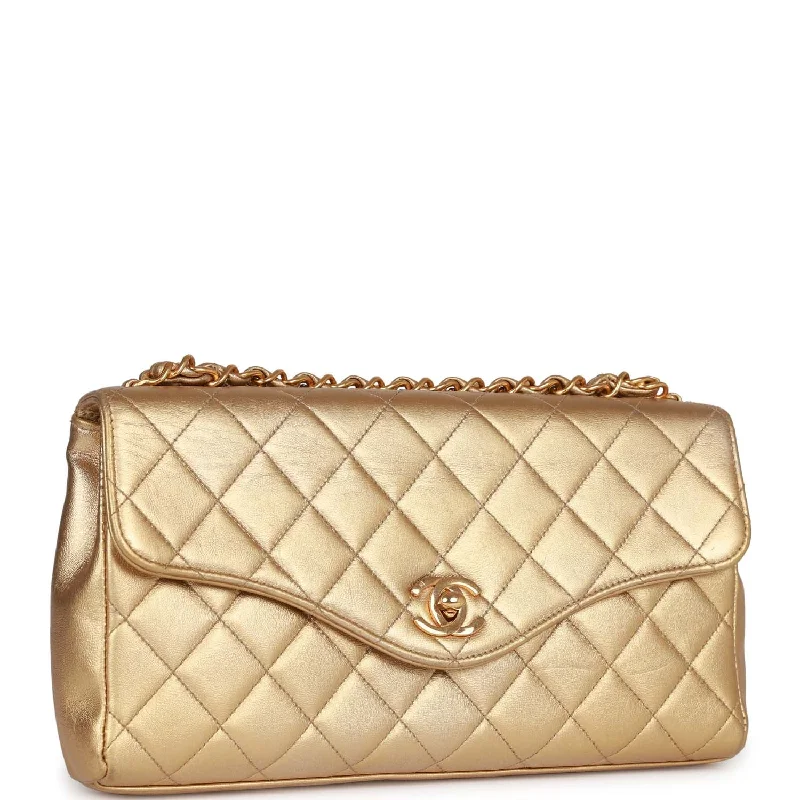 Chanel bags that pair perfectly with any outfitVintage Chanel Clutch Flap Bag with Handle Gold Metallic Lambskin Gold Hardware