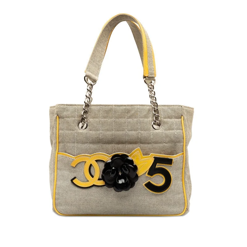 Chanel bags available in bold colors and patternsChanel None.5 Chocolate Bar Camellia Chain Handbag A31573 Yellow Gr Canvas Emmeline  CHANEL