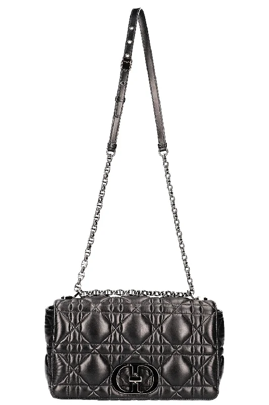 Contemporary Christian Dior handbags with a unique shapeCHRISTIAN DIOR Large Quilted Caro Bag Black