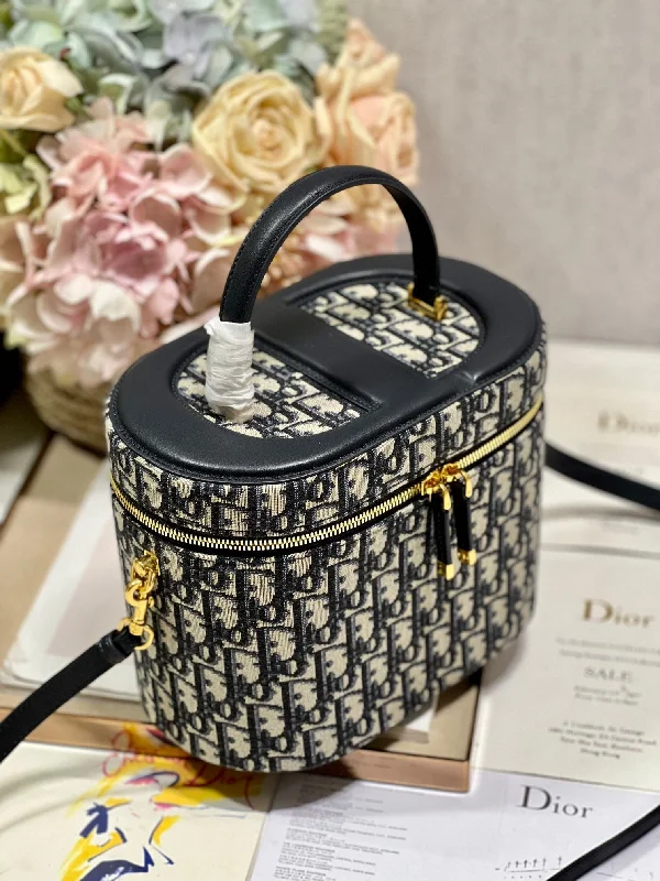 Christian Dior handbags with a snap - button closure and a decorative buckleChristian Dior - Luxury Bags  111