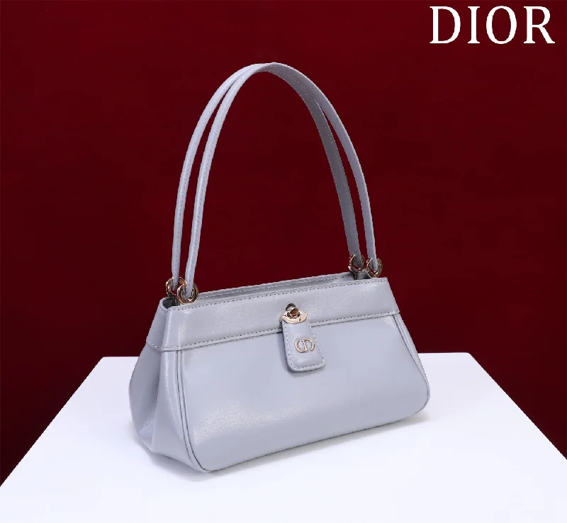 Christian Dior handbags with a snap - button closure and a decorative buckleChristian Dior - Luxury Bags  122