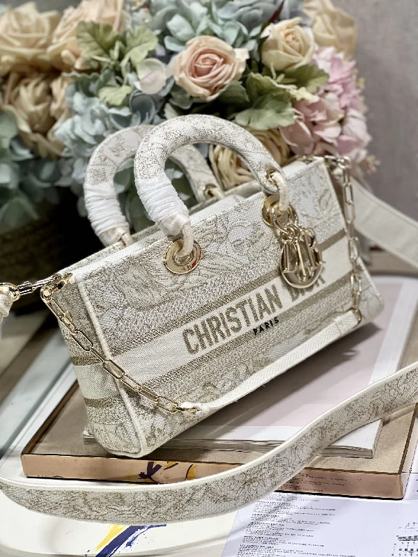 Christian Dior handbags with a snap - button closure and a decorative buckleChristian Dior - Luxury Bags  136