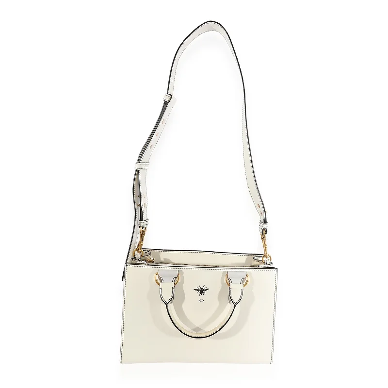 Christian Dior Saddle bags with a patent leather finish for a shiny lookCHRISTIAN DIOR White Smooth Leather D-Bee Tote