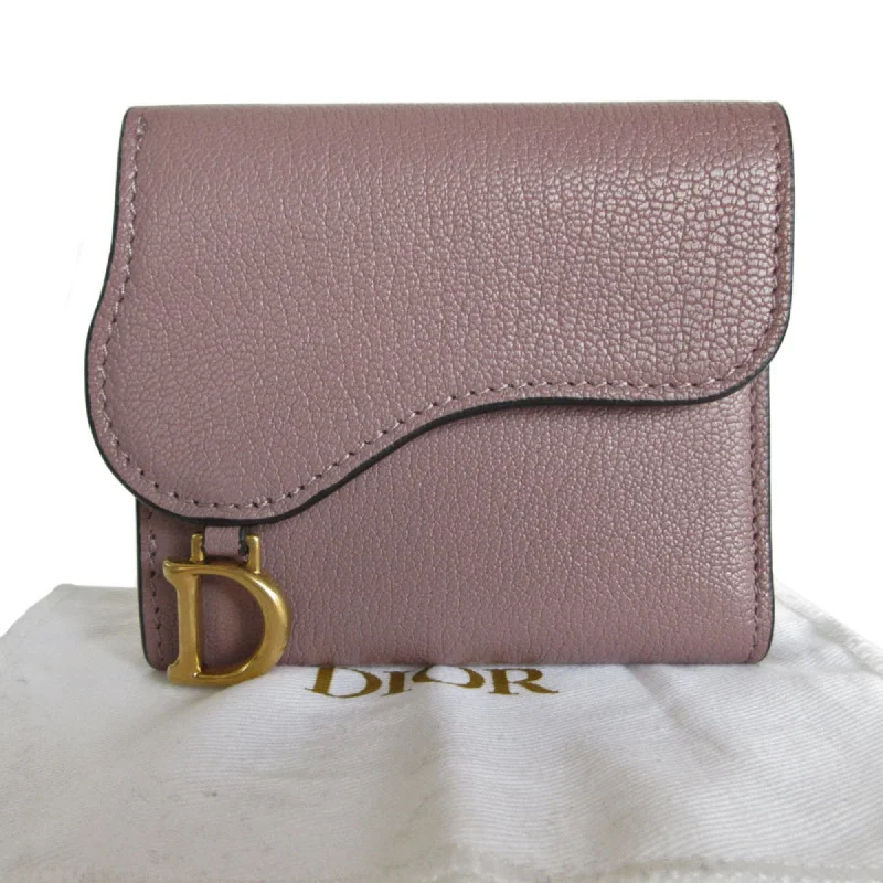 Christian Dior Saddle bags with a patent leather finish for a shiny lookDior Saddle Wallet